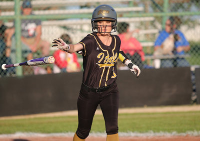 Image: Senior Lady Gladiator Cassidy Childers(3) hangs in their to earn a walk against Covington.