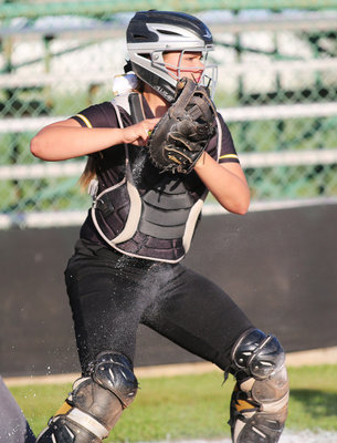 Image: Senior Lady Gladiator catcher Lillie Perry(9) is ready for battle.