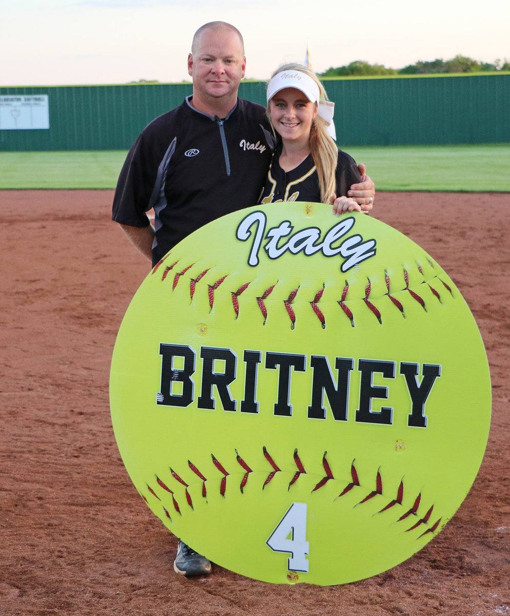Image: Italy Lady Gladiator senior Britney Chambers(4) poses with her father and coach, Michael Chambers, during Senior Day.