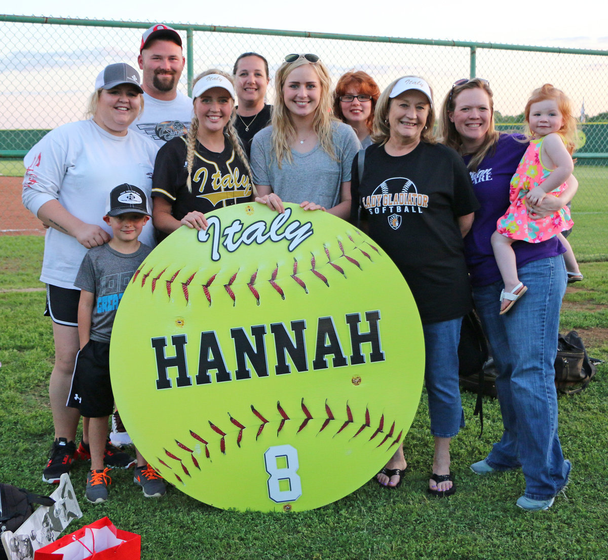 Image: Italy Lady Gladiator senior Hannah Washington(8) poses with her family during Senior Day.