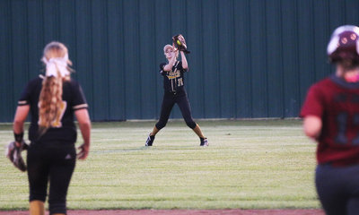 Image: Italy Lady Gladiator Freshman Karley Nelson(14) makes a senior level play by catching a Riesel pop-up to end the game and give Italy a 1-0 lead in the series.