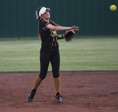 Image: Senior second-baseman Cassidy Childers(3) is all smiles with Italy needing to keep Riesel’s offense in check just one more time to secure a game 1 win in bi-district.