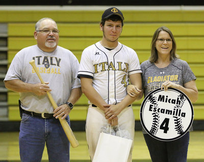Image: Senior Italy Gladiator Baseball member Micah Escamilla(4) is escorted by his parents, Frank Escamilla and Tressie Starr Escamilla for Senior Night during a post-game ceremony.