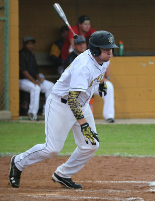 Image: With the game tied 1-1 in the bottom of the third, Austin Crawford(20) starts a 6-run rally for the Gladiators to help lead Italy to victory!