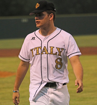 Image: Senior Gladiator Hunter Merimon(8) shows the wears of a grueling regular season as he and his senior teammates win their final district game with a 14-3 win over Itasca.