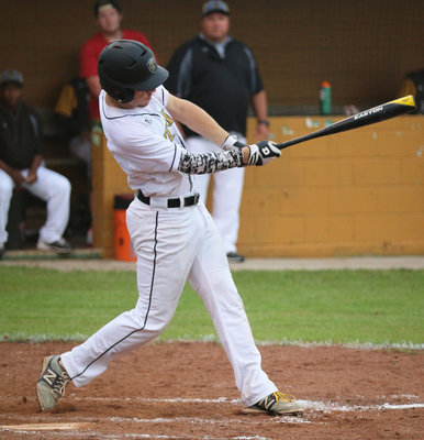 Image: Italy Gladiator Ryan Connor(7) swings a message to Itasca, “Look out, here come the Gladiators!”