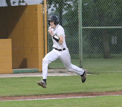 Image: Run Clayton, run! Italy’s Clayton Miller(6) and his Gladiator teammates were playing on another field in a third dimension against Itasca.