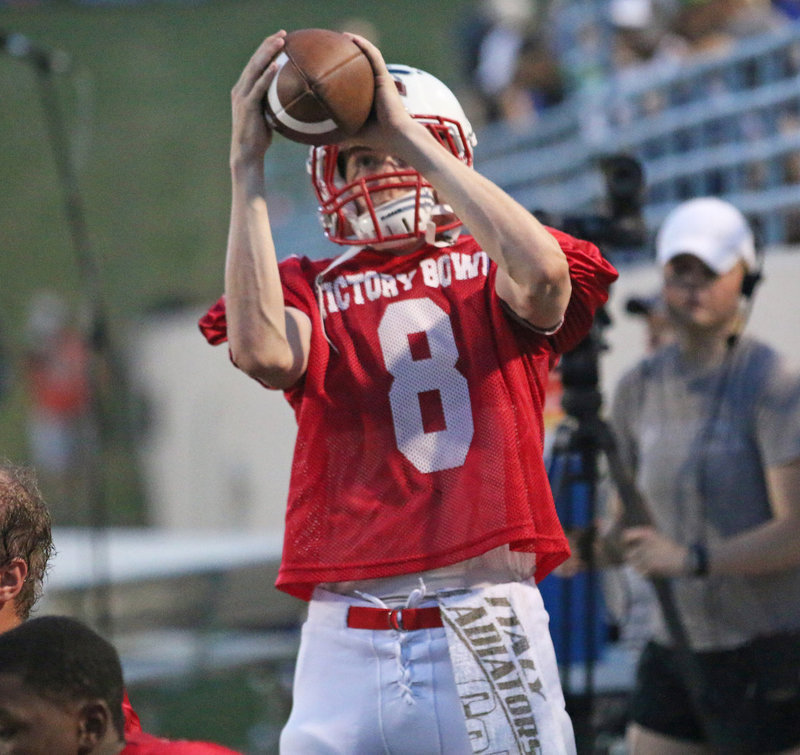 Image: Lights, camera, action as Italy Gladiator Football’s Clayton Miller(8) gets set for second-half action during the Fellowship of Christian Athletes Victory Bow VIII All-Star Football Game.