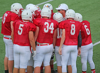 Image: Italy’s Clayton Miller(8) and the Red offense prepare to take the field in the second-quarter of the 8th Annual FCA Victory Bowl.