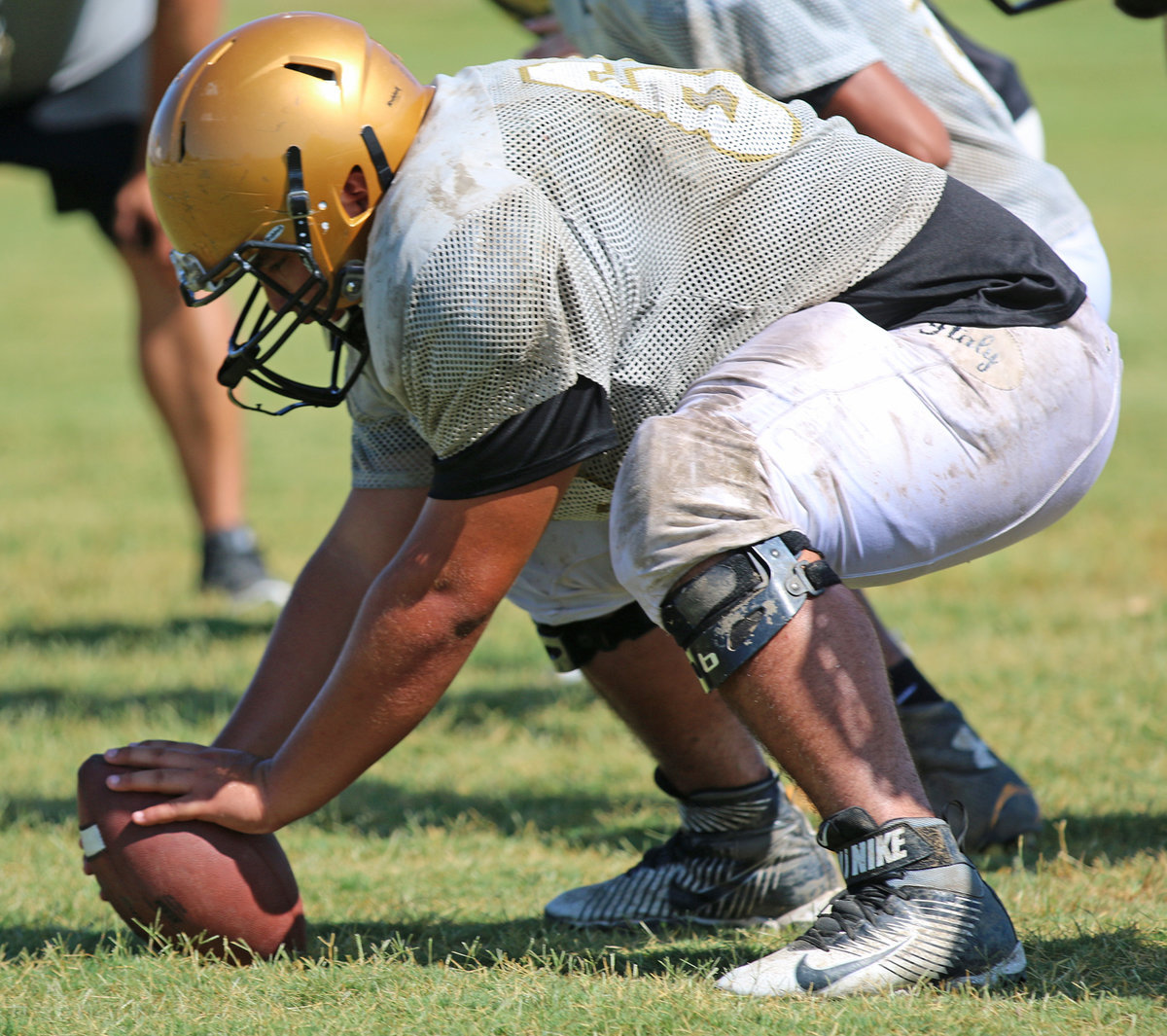 Image: Alex Garcia #68 takes over at offensive center this season.