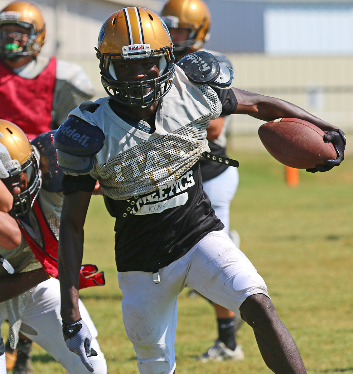 Image: Chasston WIlson #1 starts the workout off right with two elusive runs for sizable gains during Italy Gladiator Football’s annual Gold and White Scrimmage on Saturday.