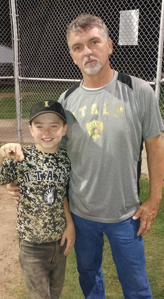 Image: Gared Wood shows off his tournament ring along with his father and Italy head coach Gary Wood.