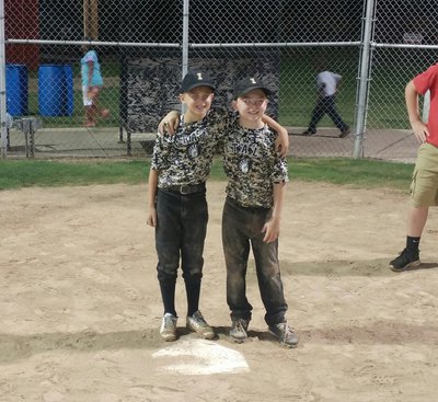 Image: Dustyn Lohner and Gared Wood pose for pictures after securing their tournament rings.