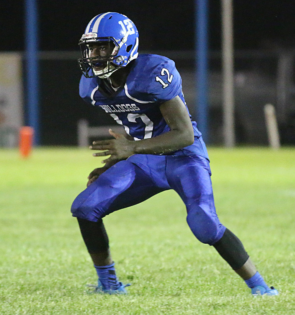 Image: Milford Bulldog #12 Jaylon Davis stayed busy all game trying to help ground the Jonesboro Eagle’s passing game.