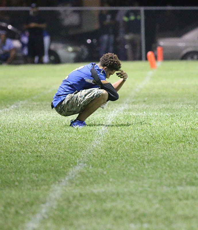 Image: Senior Bulldog #2 Devonteh Williams is visibly frustrated with not being able to help his teammates due to an injury. Hang in there, Devonteh!