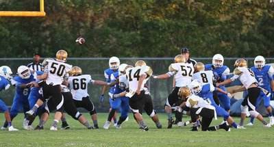Image: Against Blooming Grove, newcomer, junior kicker #14 Mauro Ibarra, went 6-out of-6 on PAT kicks for Italy with Keith Davis II holding and John Morgan snapping.
