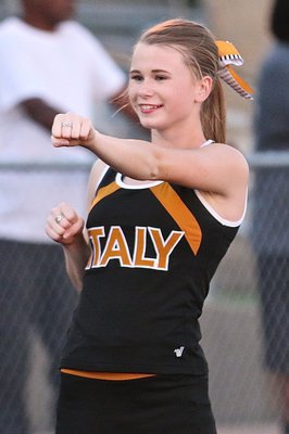 Image: Go Italy! Italy Gladiator cheerleader, Kimberly Hooker, helps her guys-in-gold punch their way to a third straight win.