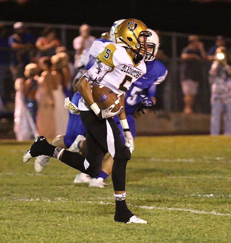 Image: Italy’s #5 Kieth Davis II returns a Lion punt down inside the Blooming Grove 5-yard line to setup an Italy touchdown.