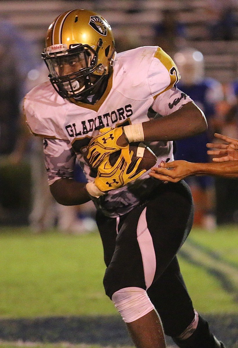 Image: The closer, #24 Christion Washington, carried 2 times for 7 yards late in the fourth-quarter to help Italy grind out the clock against Blooming Grove. Italy won 42-0 to spoil the Groves’ homecoming.