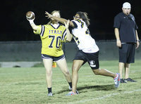 Image: Senior defender Oleshia Anderson applies pressure on junior quarterback Brycelen Richards. That’s Italy ISD AD/HFC/Ref David Weaver keeping his eyes on the action.
