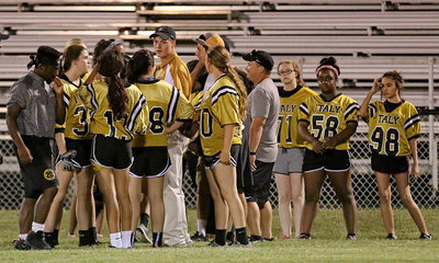 Image: Junior head coach Kendrick Norwood and assistants Clay Riddle, Gary Escamilla and Tylan Wallace rally their girls to make a push in the second-half.