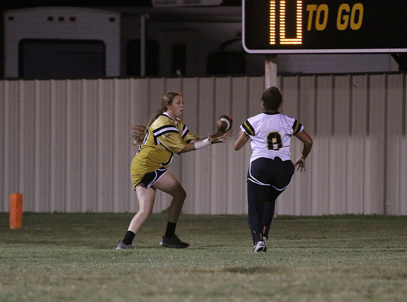 Image: Catching it on the run is junior QB/WR Brycelen Richards who scores the touchdown to keep the game close.