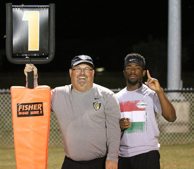 Image: Junior head coach Kendrick Norwood agrees with Coach Rowe and the down marker as the Powder Puff game nears conclusion.