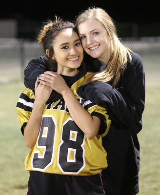 Image: Kirsten Viator gives a “nice job” hug to Rose DeLeon.