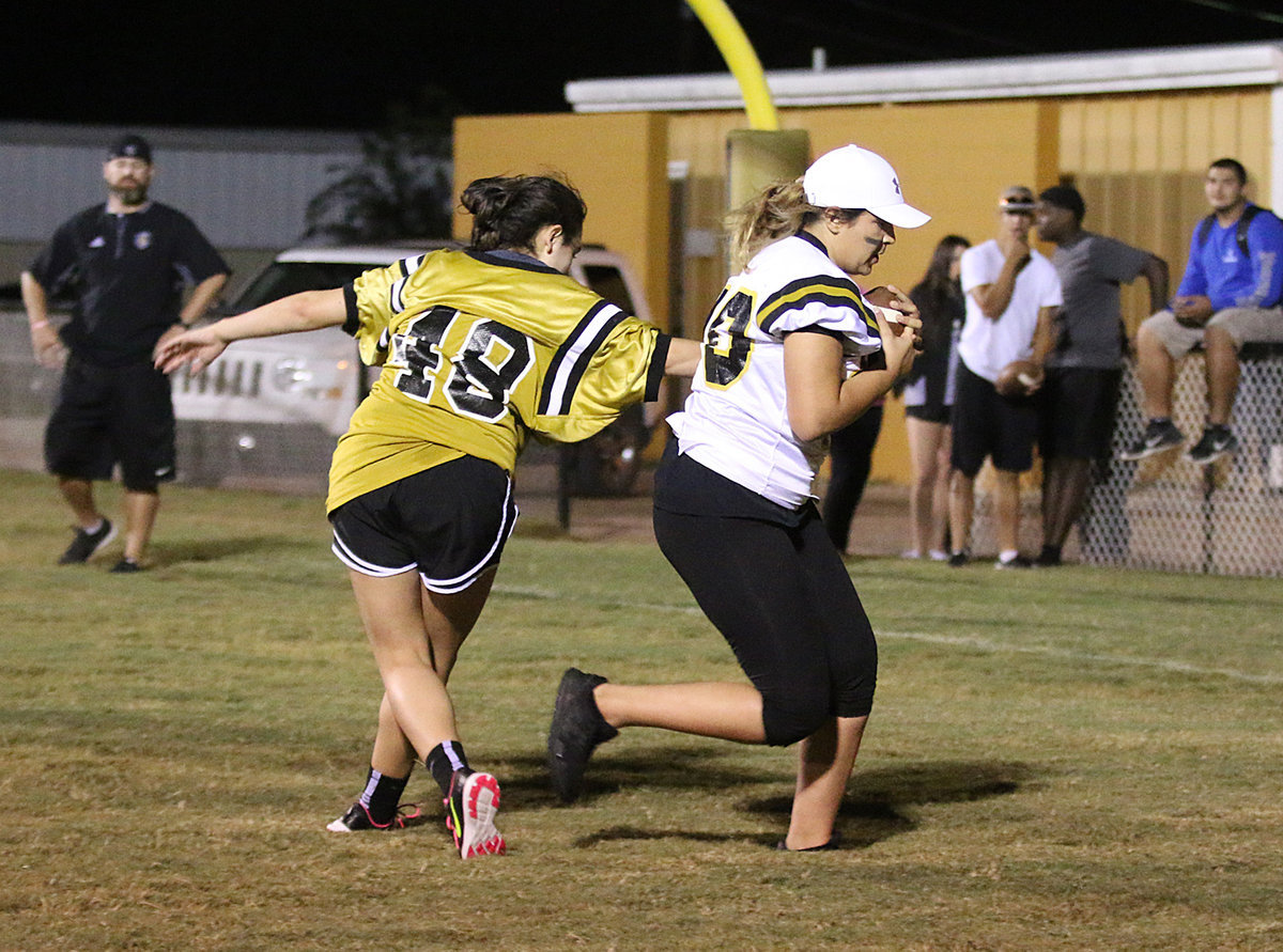 Image: Heaven-Lea Bossu-Browne makes the victory sealing touchdown catch to help secure the Powder Puff win, 24-12, for the Senior Girls.