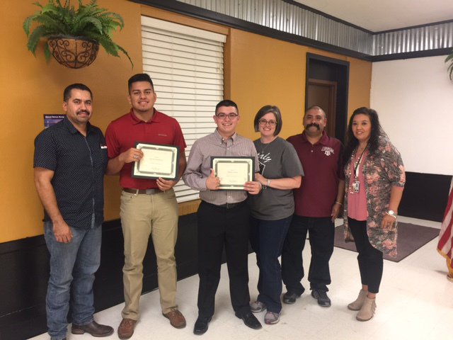 Image: Isidro DeLaHoya, father with David DeLaHoya; Eli Garcia with parents Davee and Albert Garcia, and Tina Richards, IHS Academic Adviser