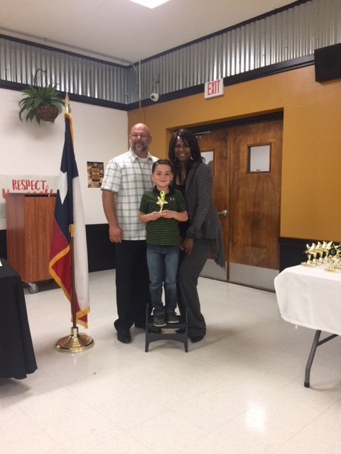 Image: 1st Grade Superintendent Star Student, Tripp Slovak with Mr. Joffre, Superintendent and Ms. Thomas, Principal of Stafford Elementary