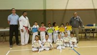 Image: Pictured: Top Row: Travis Tinney, Instructor,  Roger Sam, Turtle Cadet Instructor, Gryphon Kight-Waco, Daniel Goates-West, Jocelyne Crisostomo-Hillsboro, Ryan Thompson-Penelope, David Flores-Hillsboro, Ayden Vargas-Hillsboro and Master Charles Kight-Chief Instructor of the school.
Front Row:  Elile Morales-Itasca, Fabian Morales-Itasca, Harmony McKnight-Whitney, Christian McKnight-Whitney and Noah Hayes-Italy.