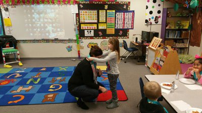 Image: Nurse Guilliams receives a medal for promoting and spear-heading Carter Blood Care’s Blood Drive.