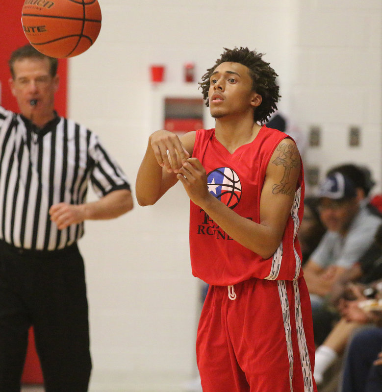 Image: Representing Italy during the 16th Annual Maypearl Texas Roundup All-Star Boys Game is Keith Davis II as he inbounds the ball to get the contest rolling.